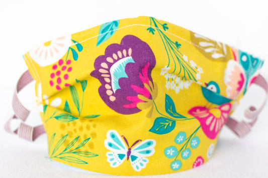 kids face mask yellow, purple, teal, flowers with butterflies and birds